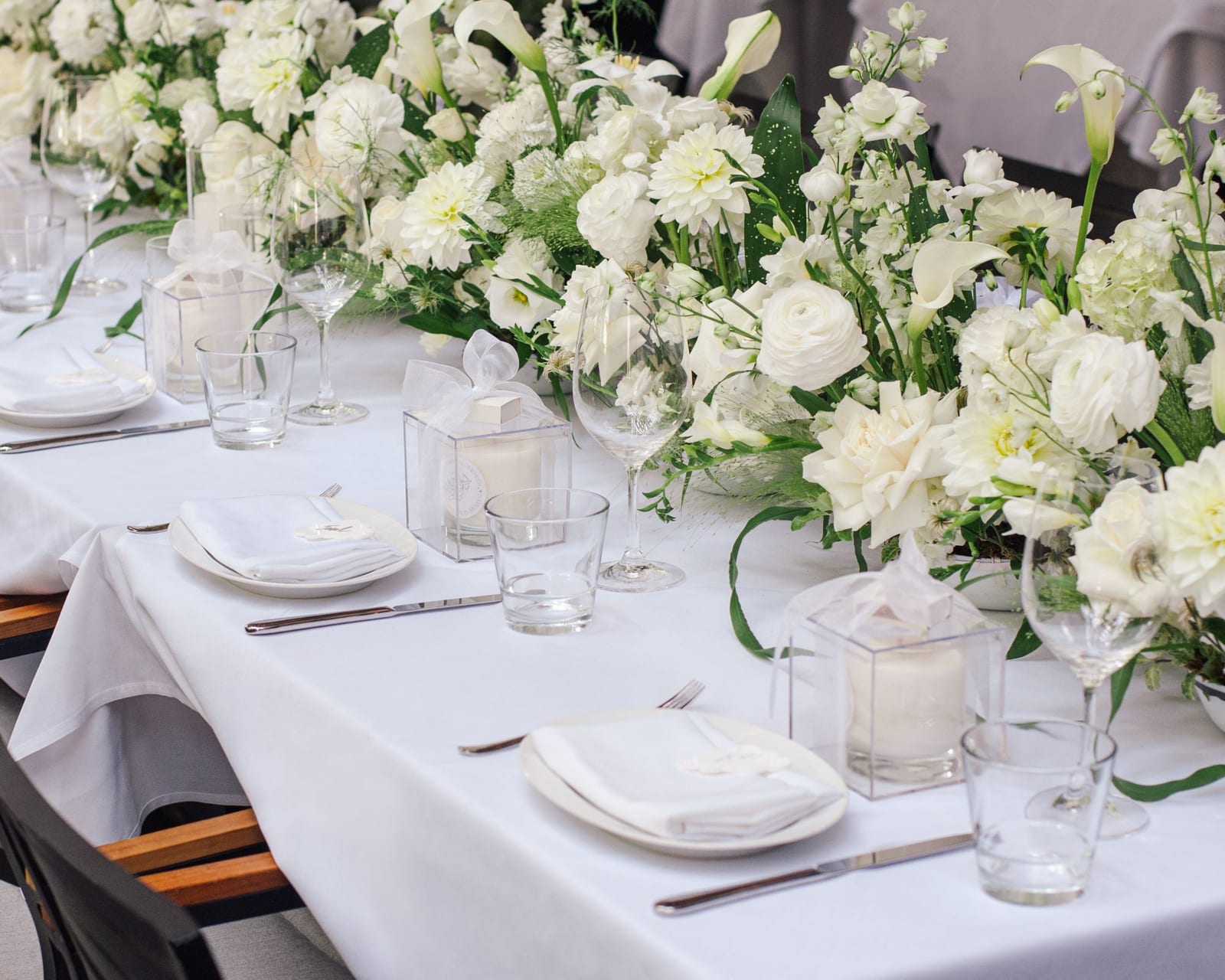 Florals and place settings on the Garden Patio at Black+Blue Toronto